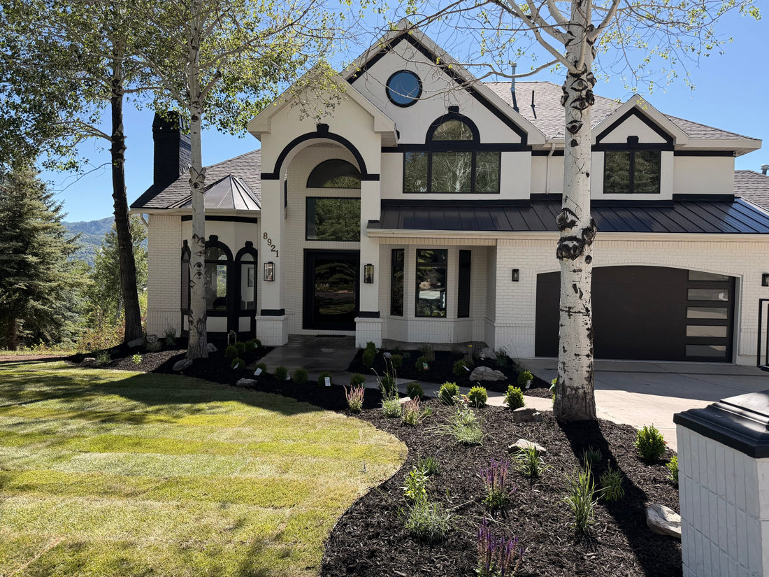Front yard landscaping project in Park City with sod installation, mulch, planting beds, shrubs, and mountain-style curb appeal