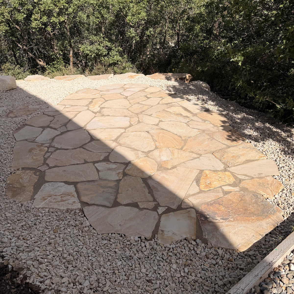 Flagstone patio with natural stone in a Park City landscape project