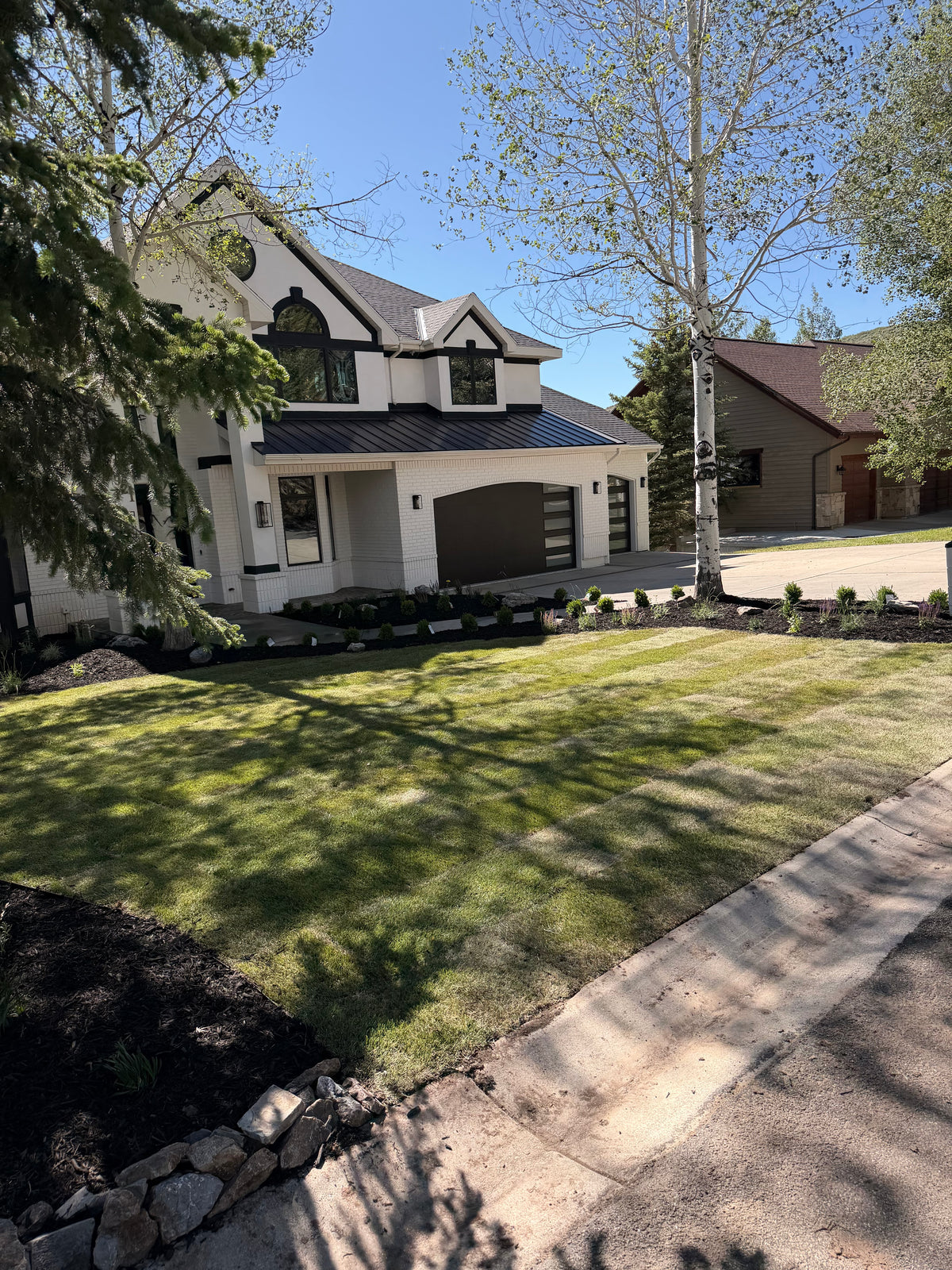Luxury home with new sod lawn and driveway in Park City
