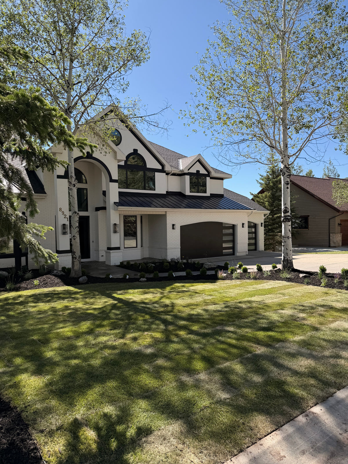 Luxury home front yard with new sod in Park City