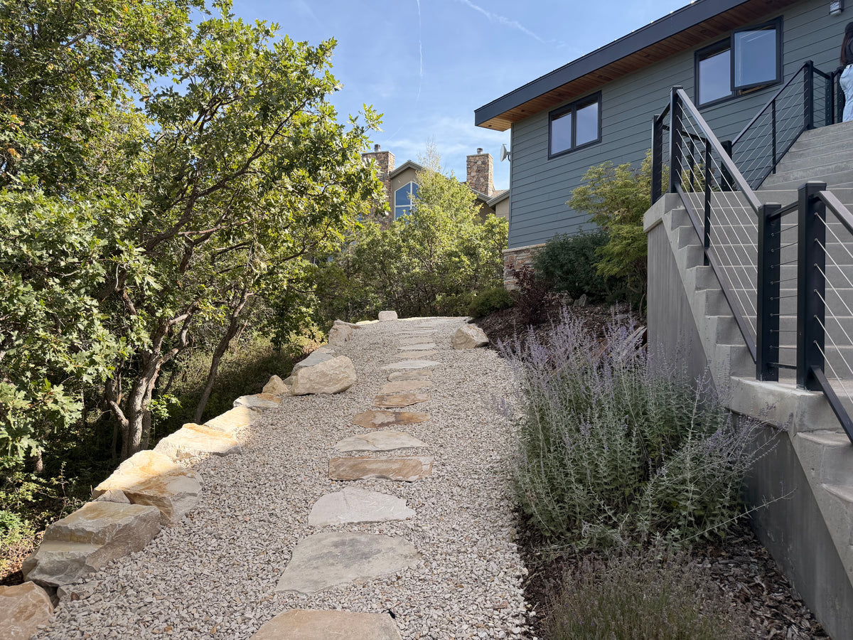 Flagstone walkway after landscape renovation in Park City